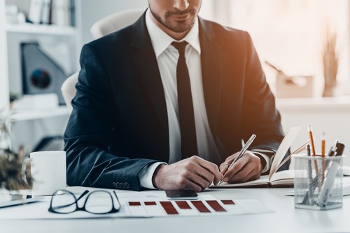 man looking at data nqueue